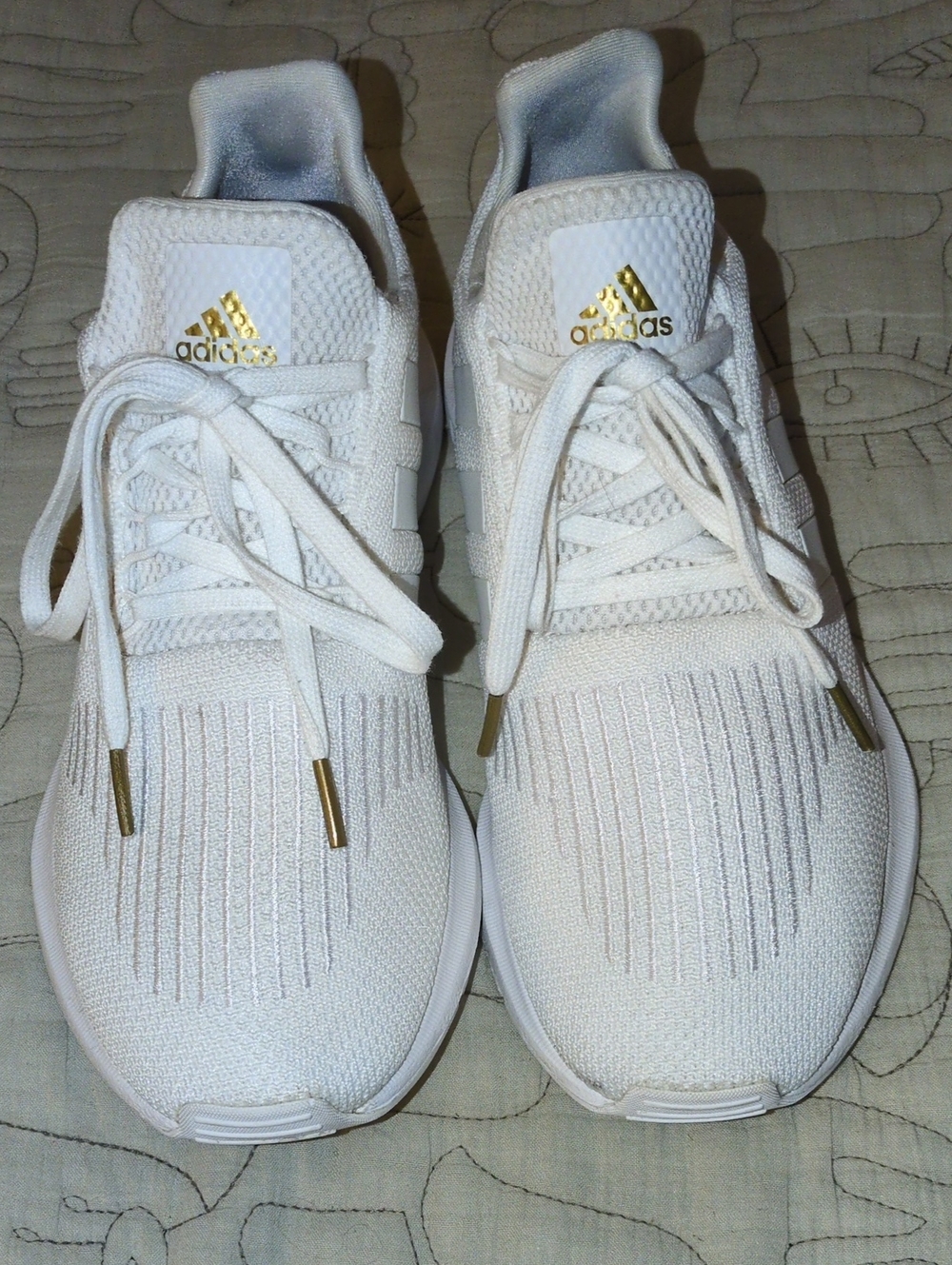 adidas White Knit Sneakers with Gold Accents